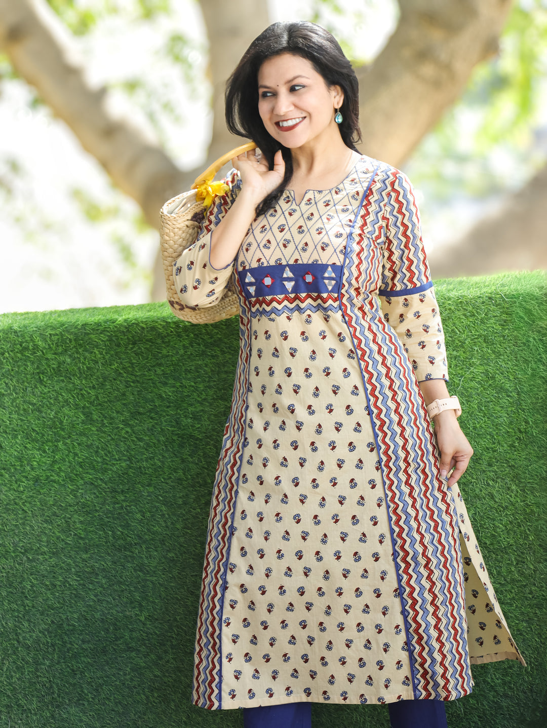 Mehram Cream Beige Running Thread Yoke in Panel Style Ajrak Printed Cotton Kurti