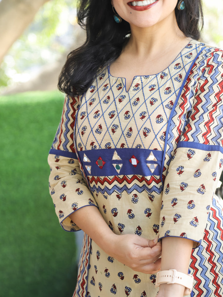 Mehram Cream Beige Running Thread Yoke in Panel Style Ajrak Printed Cotton Kurti