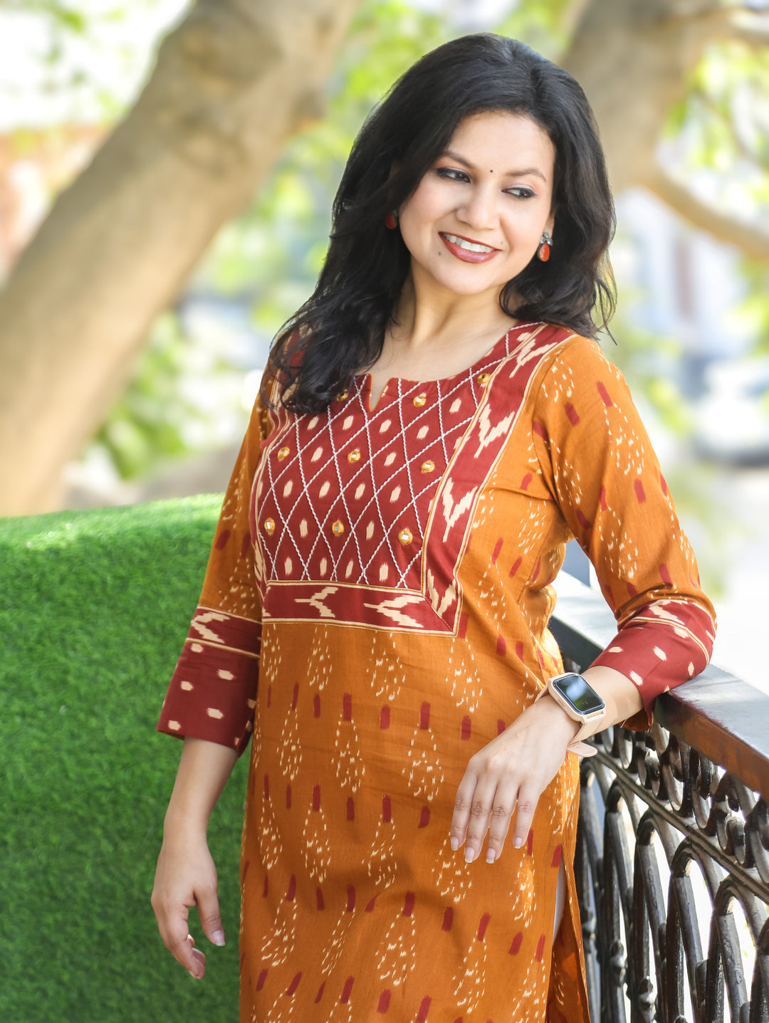 Kesariya Peanut Yellow with Barn Rust Yoke with Mirror Work Ikkat Printed Cotton Kurti