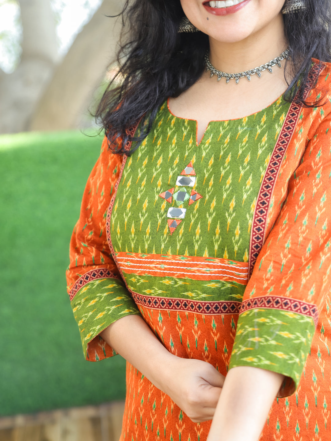 Kesariya Dark Orange with Green Yoke with Mirror Work Ikkat Printed Cotton Kurti D2
