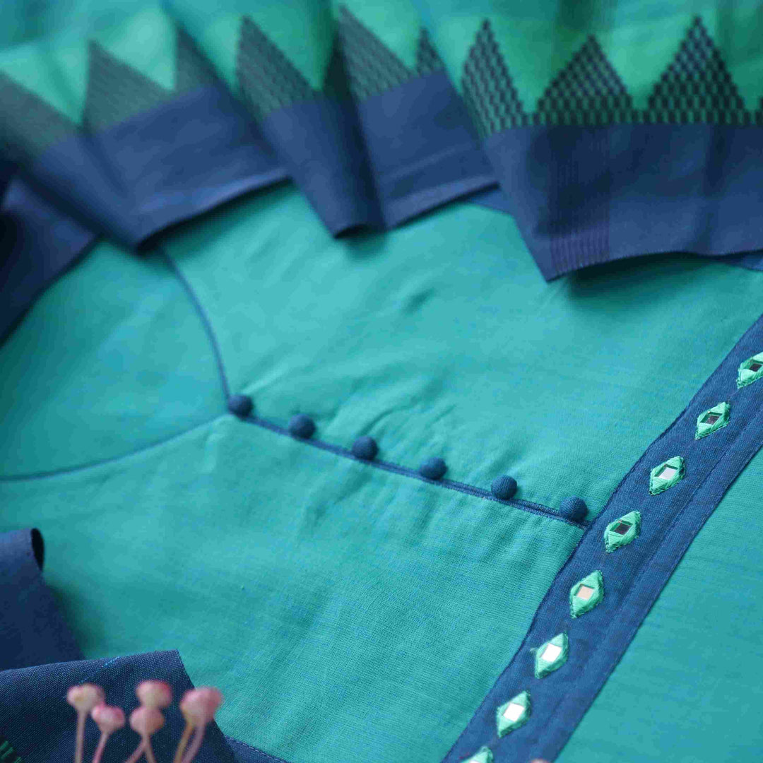 Sanskruti Teal Blue Mirror Work Neck South Cotton Temple Hem Suit Set
