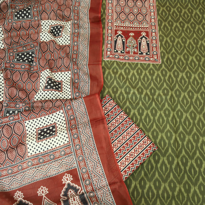 Jogiya Grass Green Ajrak Printed Thread with Mirror Yoke Ikkat Print Cotton Suit Set