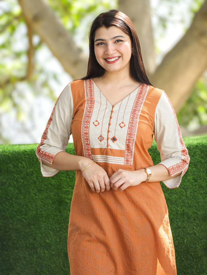 Saundraya Tangerine Rust Mirror with Potli Button Work Yoke Running Stitch Cotton Kurti