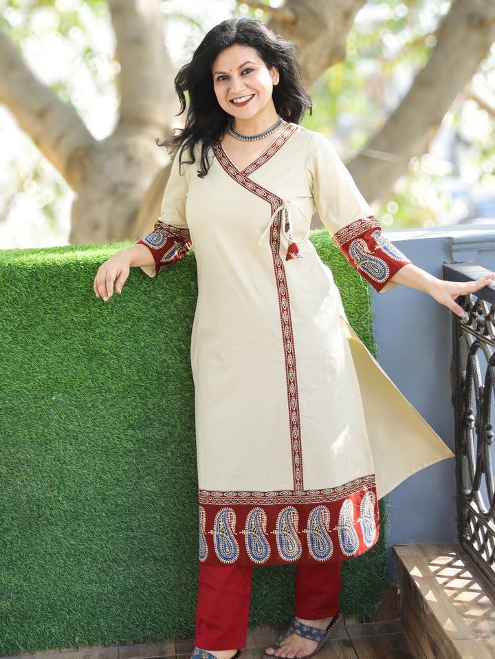 Vrishti Cream Beige Angrakha Neck with Knot Paisley Printed Hemline Cotton Kurti