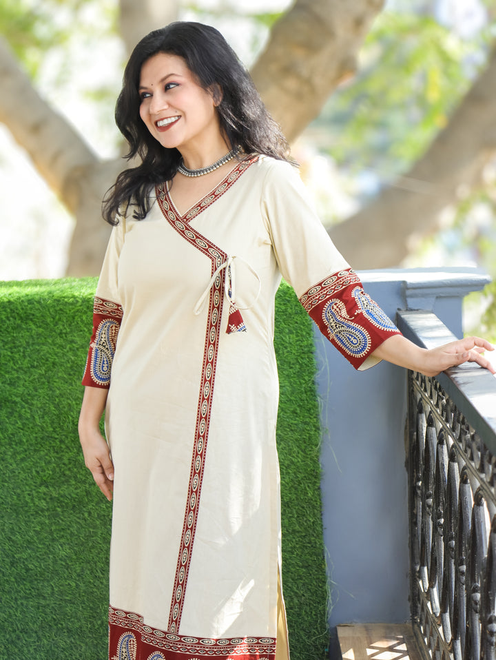 Vrishti Cream Beige Angrakha Neck with Knot Paisley Printed Hemline Cotton Kurti