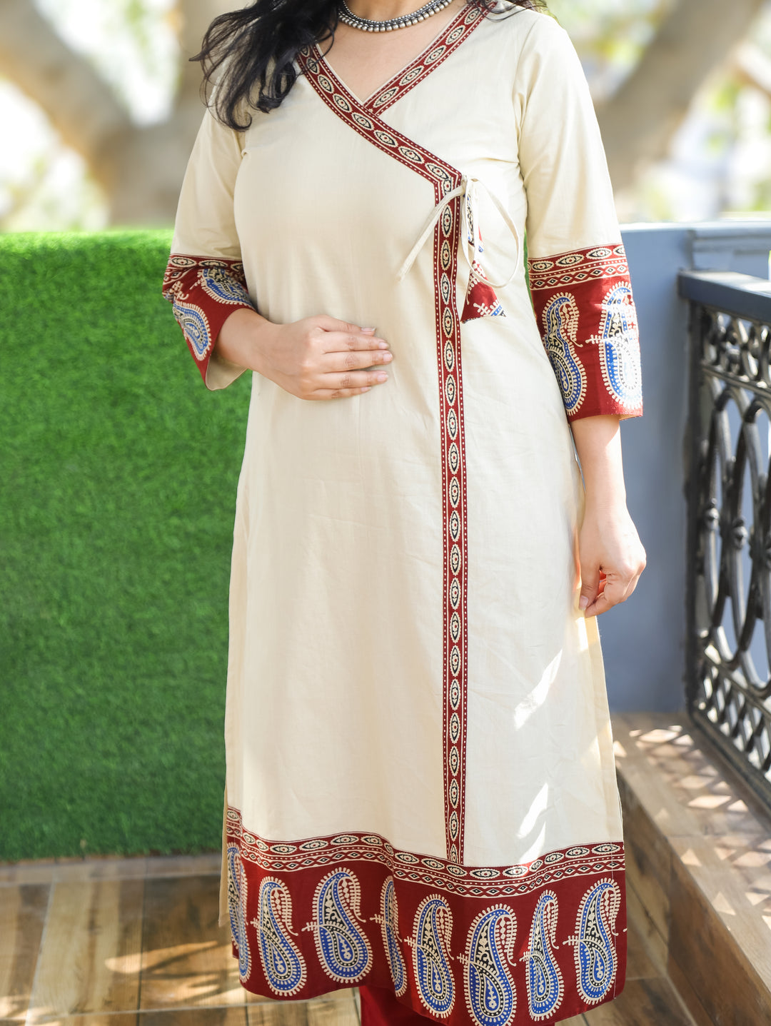 Vrishti Cream Beige Angrakha Neck with Knot Paisley Printed Hemline Cotton Kurti