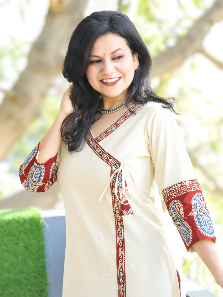 Vrishti Cream Beige Angrakha Neck with Knot Paisley Printed Hemline Cotton Kurti