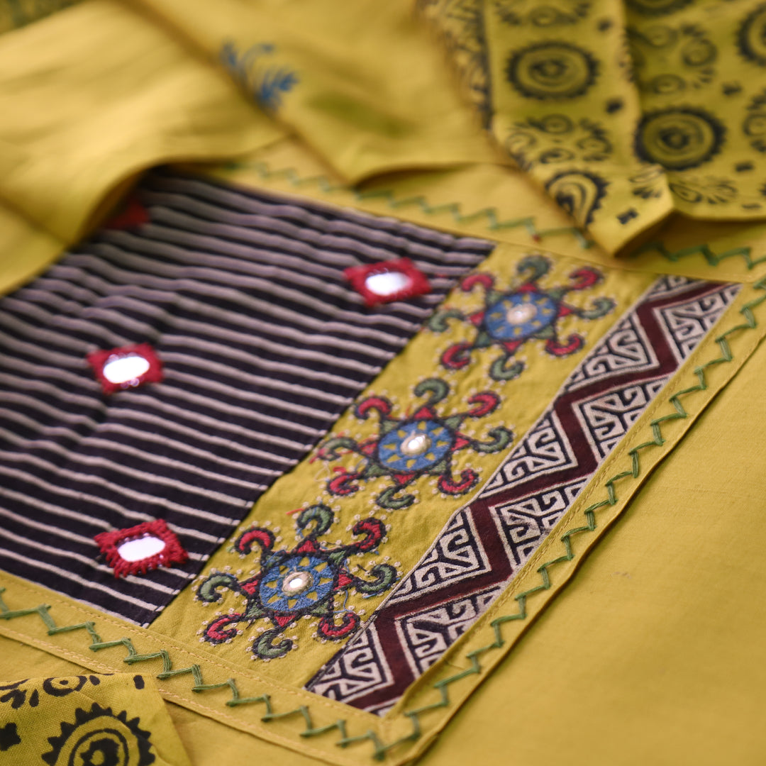Kusumdari Turmeric Yellow Ajrak Printed Yoke with Mirror Work Cotton Suit Set