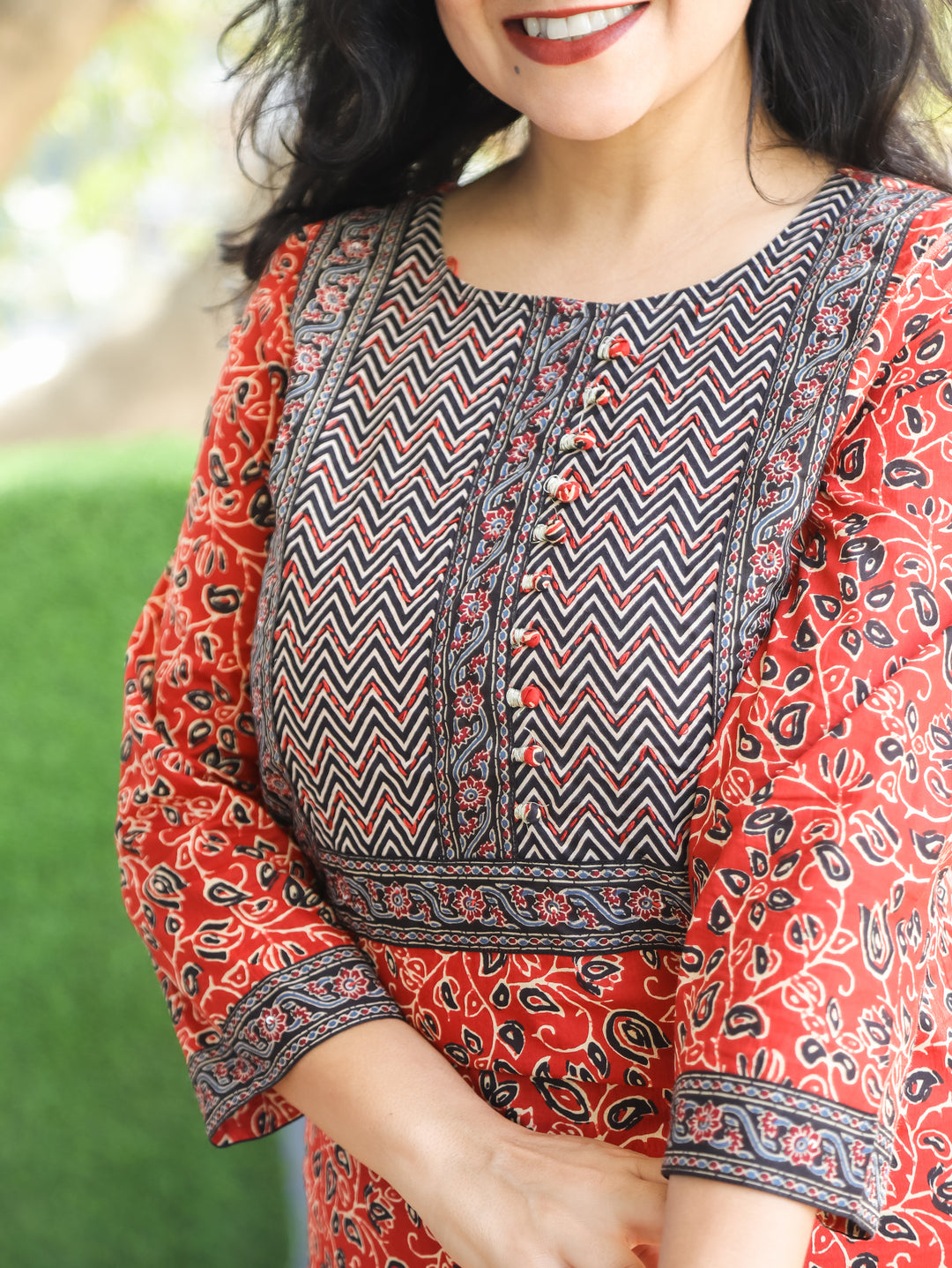 Suhana Cherry Red Potli Work Yoke in Kalamkari Printed Cotton Kurti