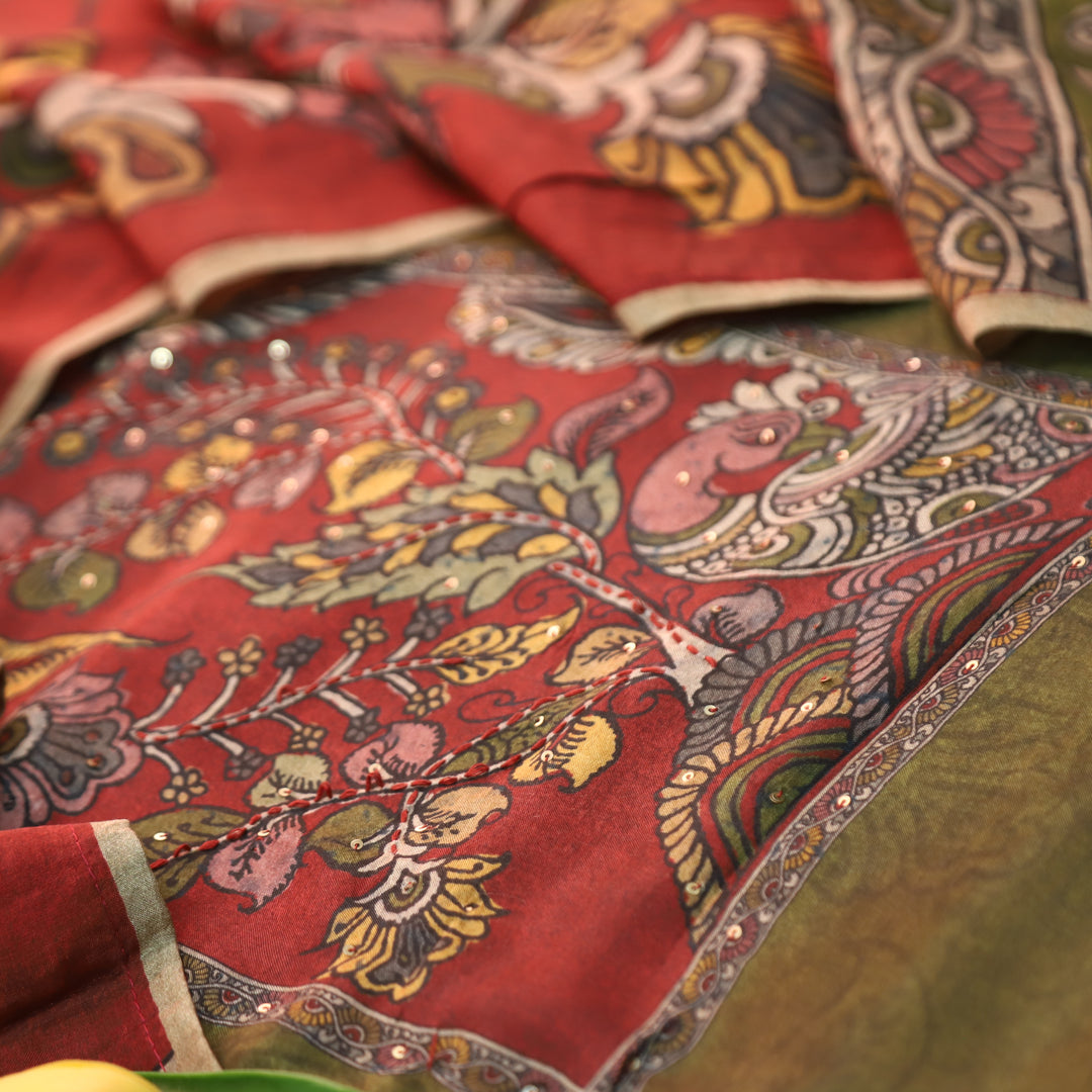 Menesa Olive Green Kalamkari Printed Yoke in Self Printed Muslin Suit Set