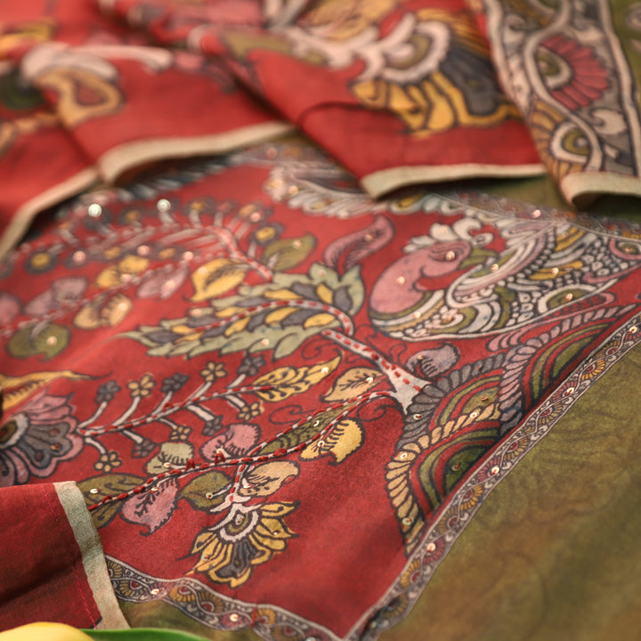 Menesa Olive Green Kalamkari Printed Yoke in Self Printed Muslin Suit Set