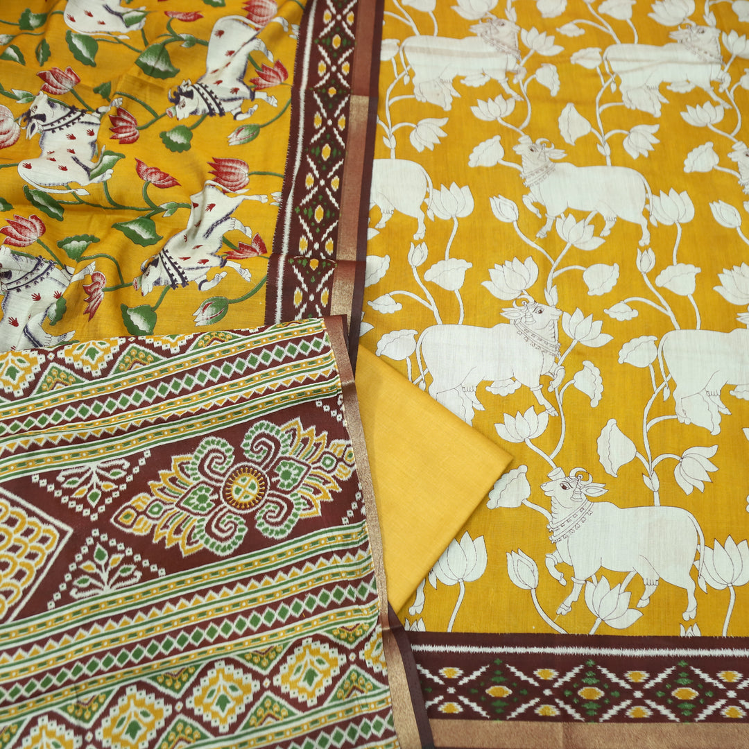 Saatvi Corn Yellow Pichwai Print with Ikkat Print Hem Viscose Maheshwari Set
