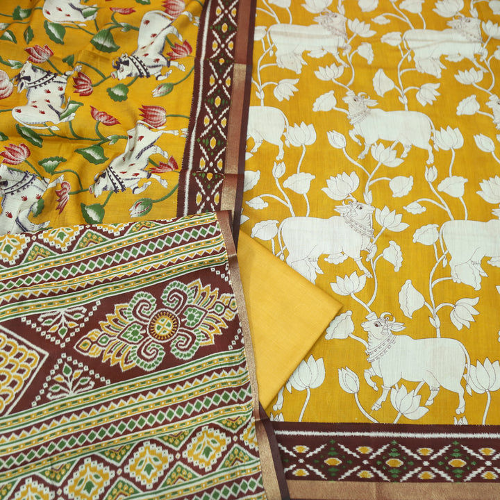 Saatvi Corn Yellow Pichwai Print with Ikkat Print Hem Viscose Maheshwari Set