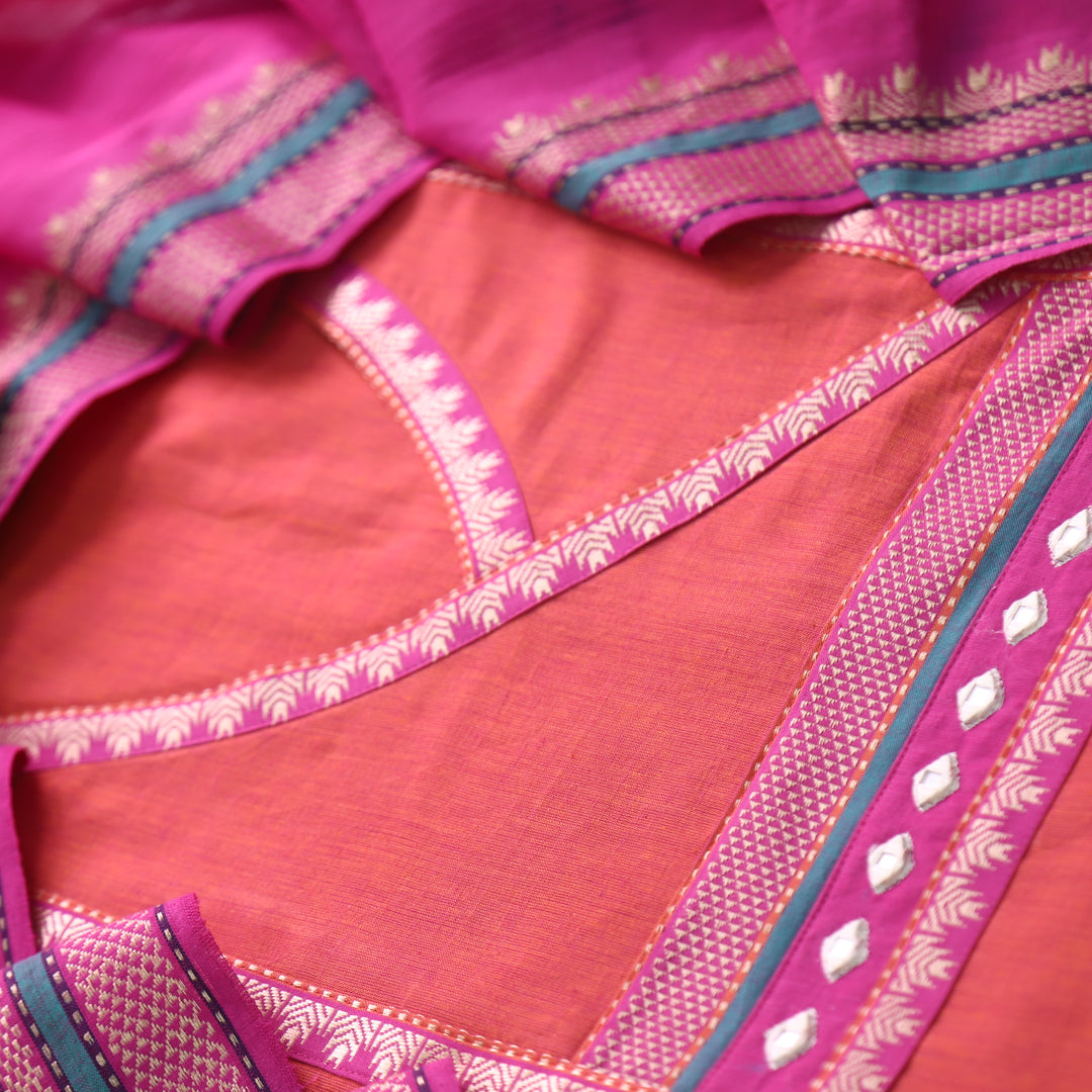 Sanskruti Orange with Magenta Angrakha Style South Cotton Temple Hem Suit Set
