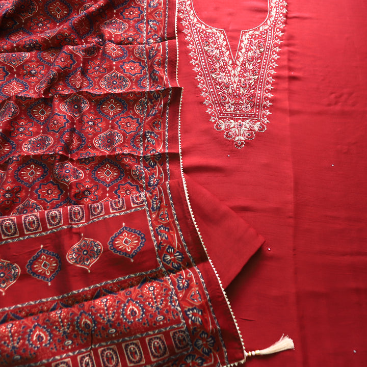 Shreya Maroon Red Embellish Neck Work with Patra Detailing Dola Silk Set