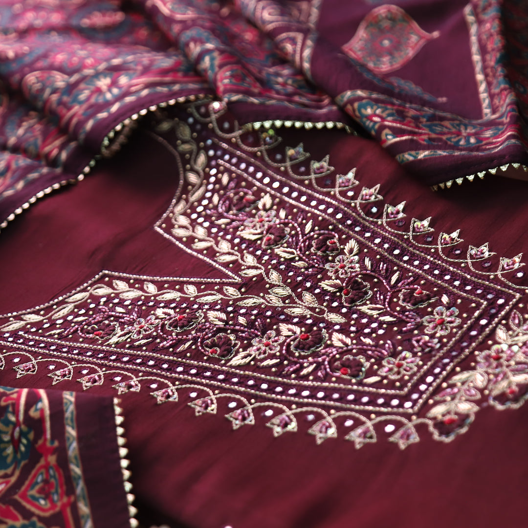 Shreya Mahogany Wine Embellish Neck Work with Patra Detailing Dola Silk Set