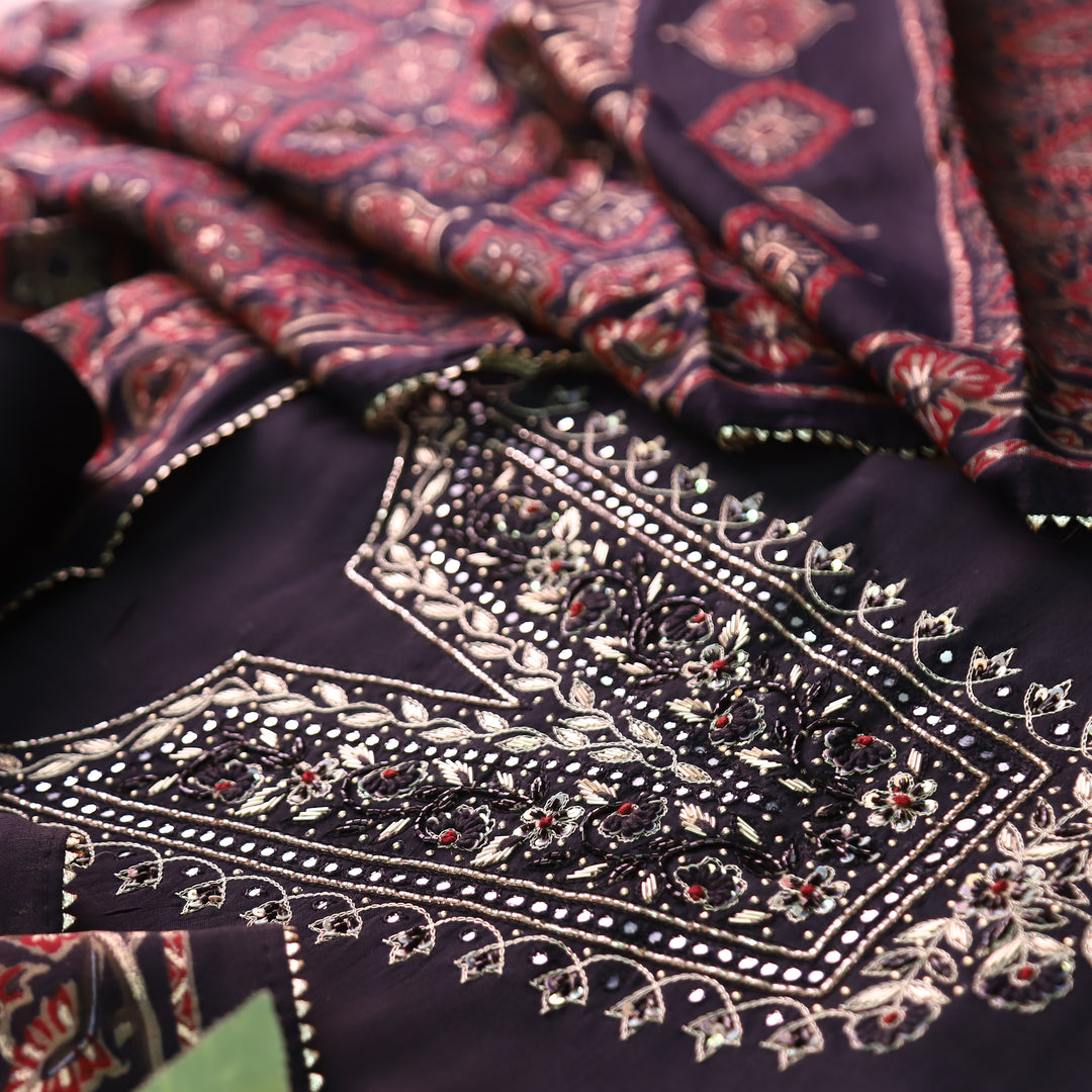 Shreya Midnight Black Embellish Neck Work with Patra Detailing Dola Silk Set