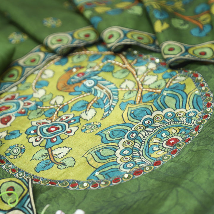 Menesa Forest Green Kalamkari Printed Yoke in Self Printed Muslin Suit Set