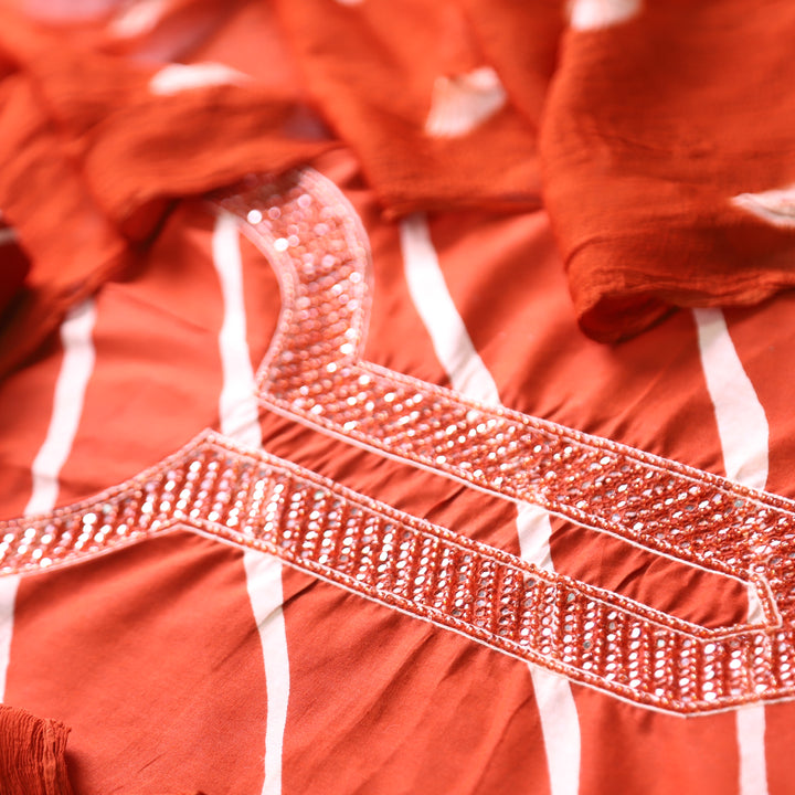 Bilori Rust Orange Embellish Neck with Leheriya Print Cotton Set