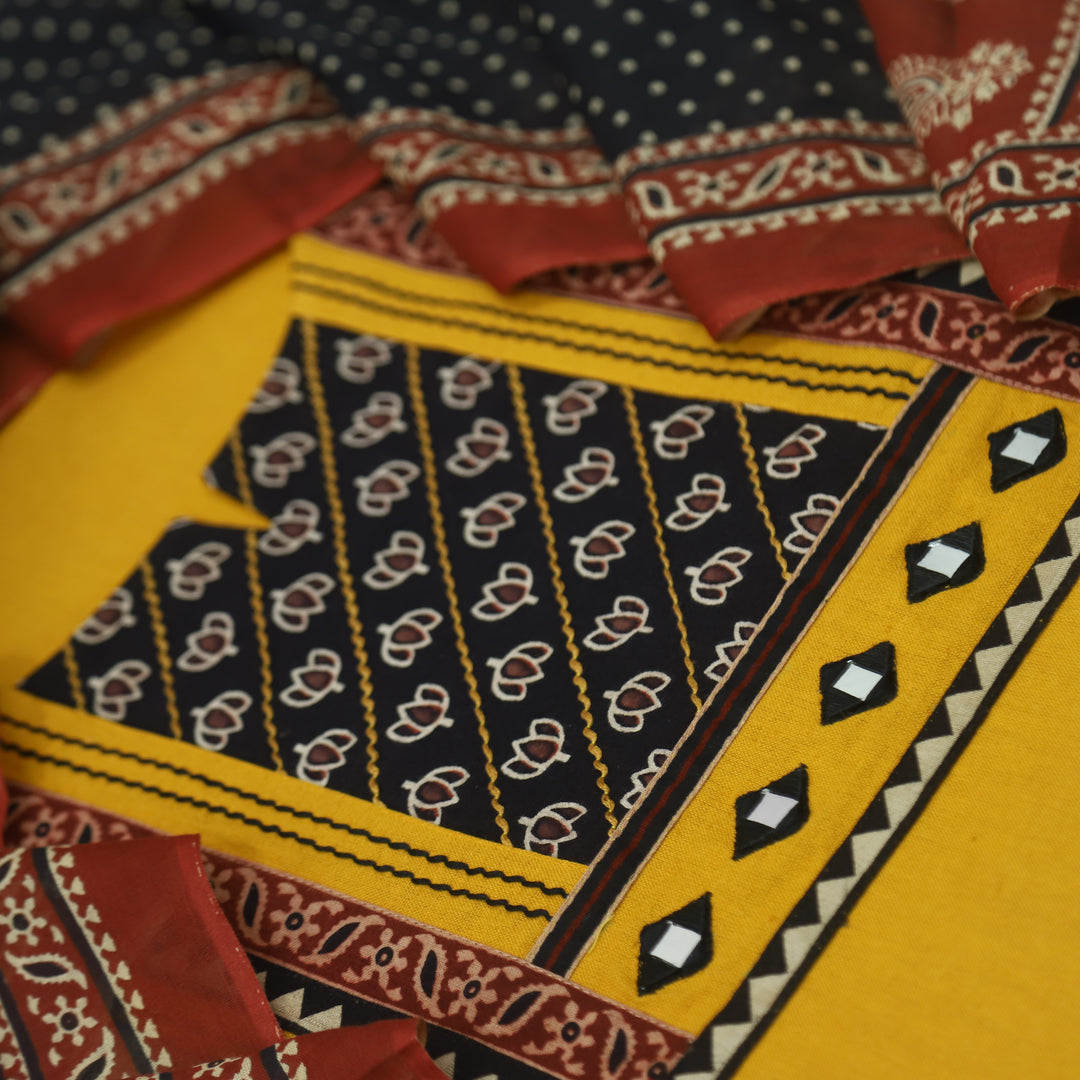 Sulari Canary Yellow with Black Printed Kutch Patch Neck Cotton Flex Suit Set