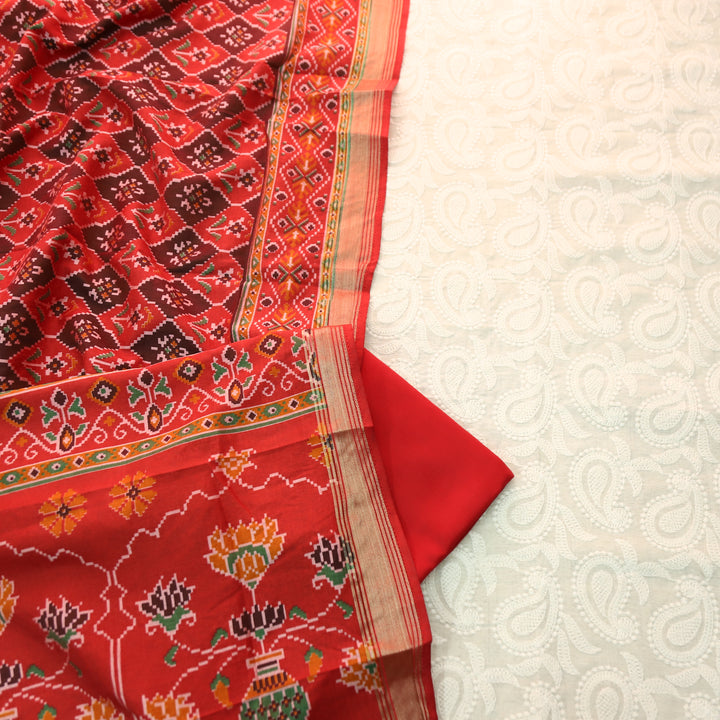 Amriti Beige All Over Embroidered Linen Set with Red Patola Dupatta