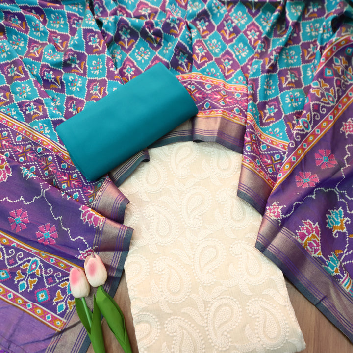 Amriti Beige All Over Embroidered Linen Set with Aqua Patola Dupatta
