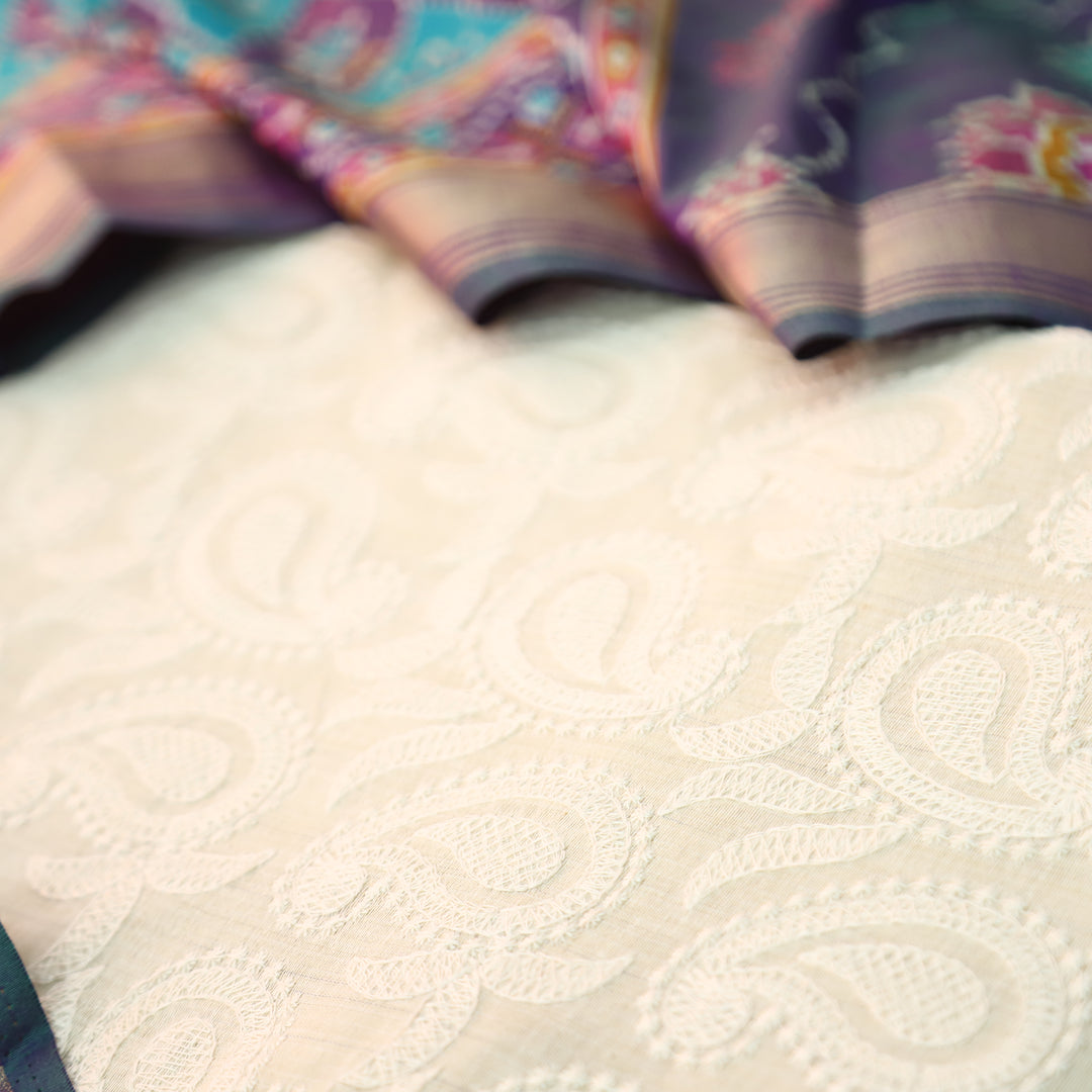 Amriti Beige All Over Embroidered Linen Set with Aqua Patola Dupatta