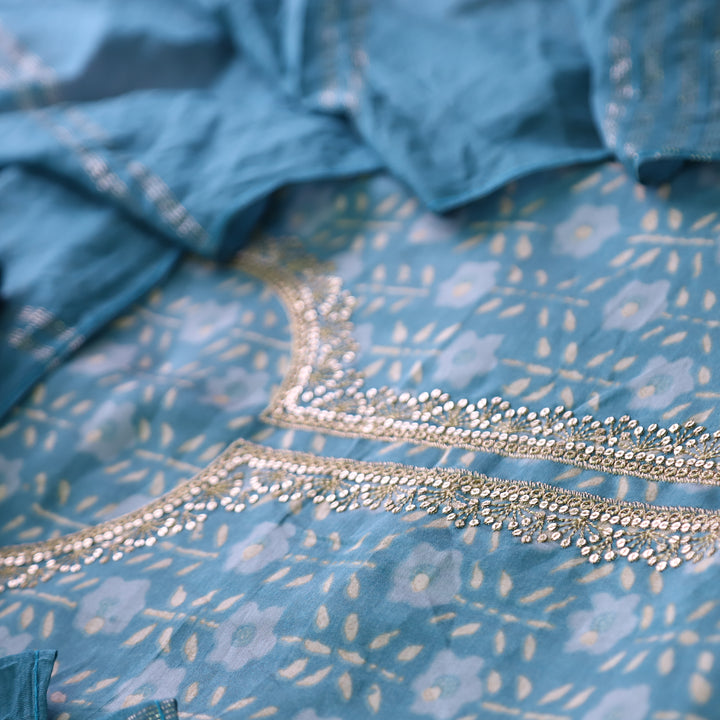 Sajna Cerulean Aqua Embellish Zari Neck Work in Foil Work Modal Suit Set