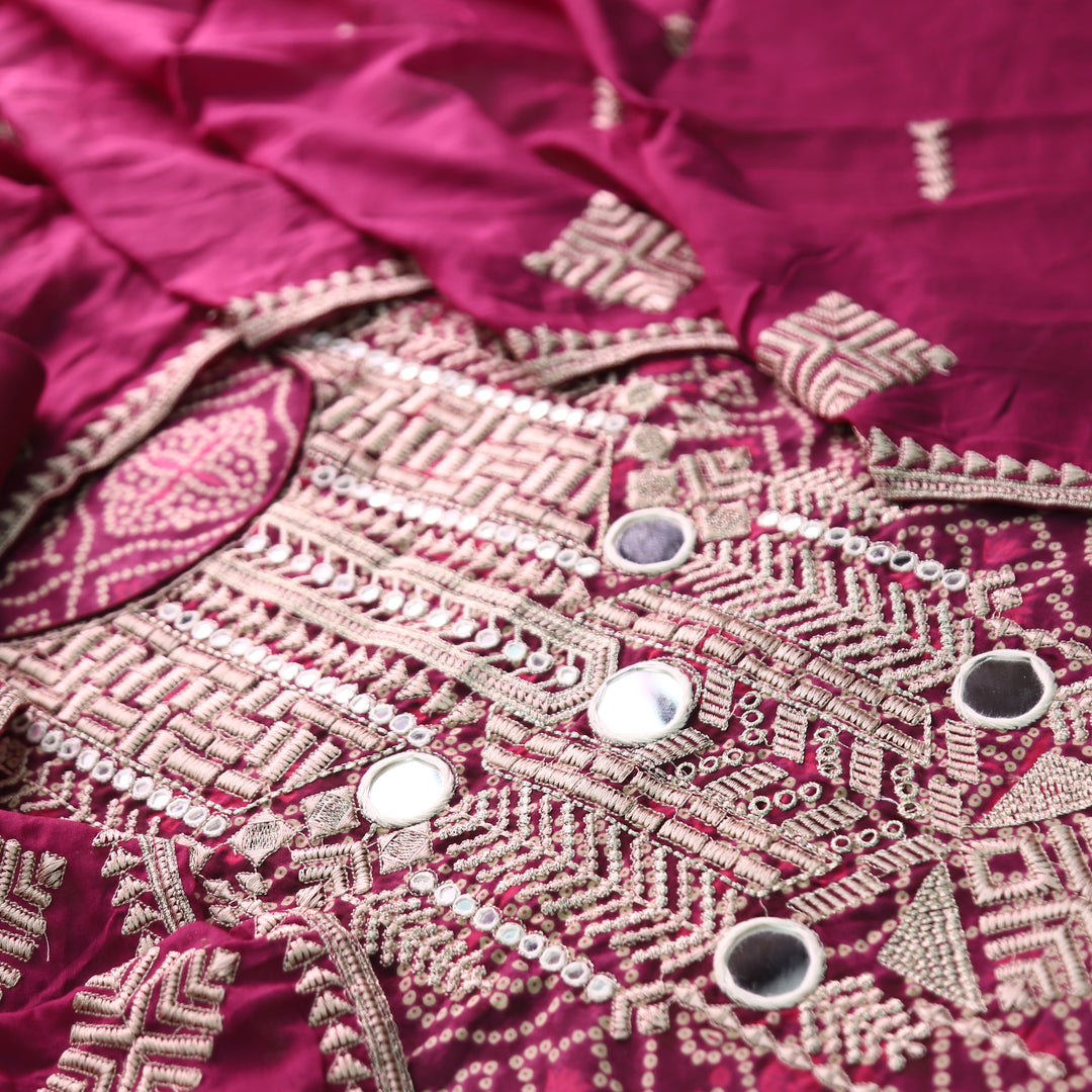 Nandini Jamuni Purple Mirror Embellished Neck Work Bnadhani Print Cotton Set