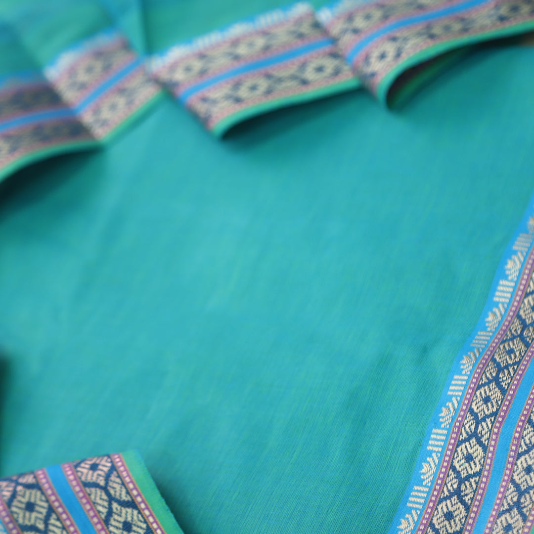 Sanskruti Ocean Cyan Mangalgiri Hem in South Cotton Suit Set