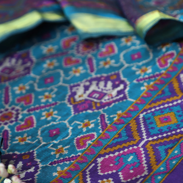 Raya Azure Turq All Over Patola Shadow Printed Work Muslin Set
