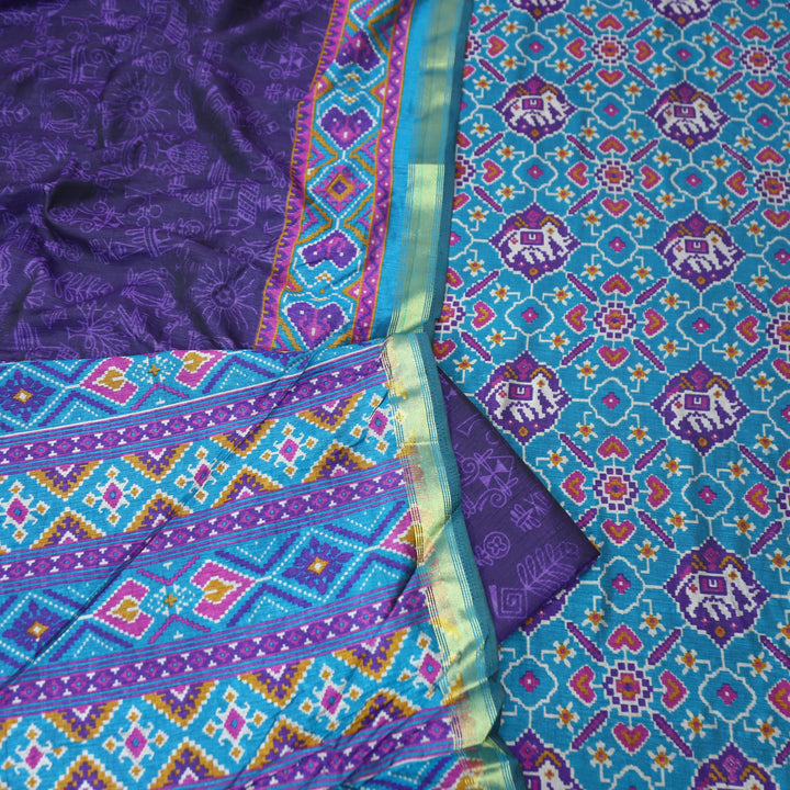 Raya Azure Turq All Over Patola Shadow Printed Work Muslin Set