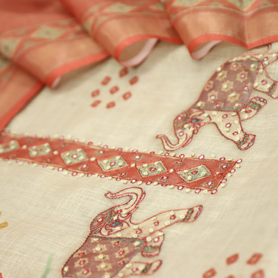 Bareli Off White Patra with Knot Patch Elephant Print Hem Shimmer Tissue Linen Set