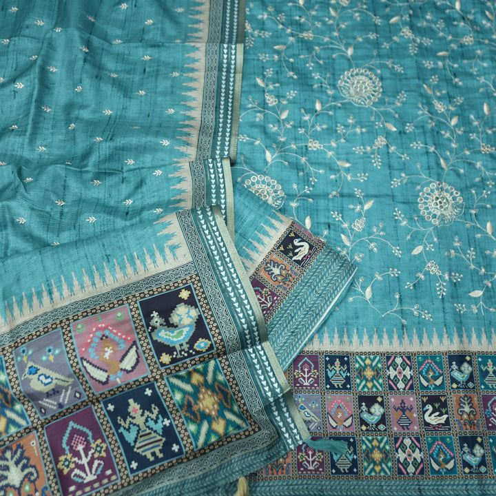 Rishika Stone Blue Schiffli with Thread Work Printed Hem Tussar Chanderi Silk Set