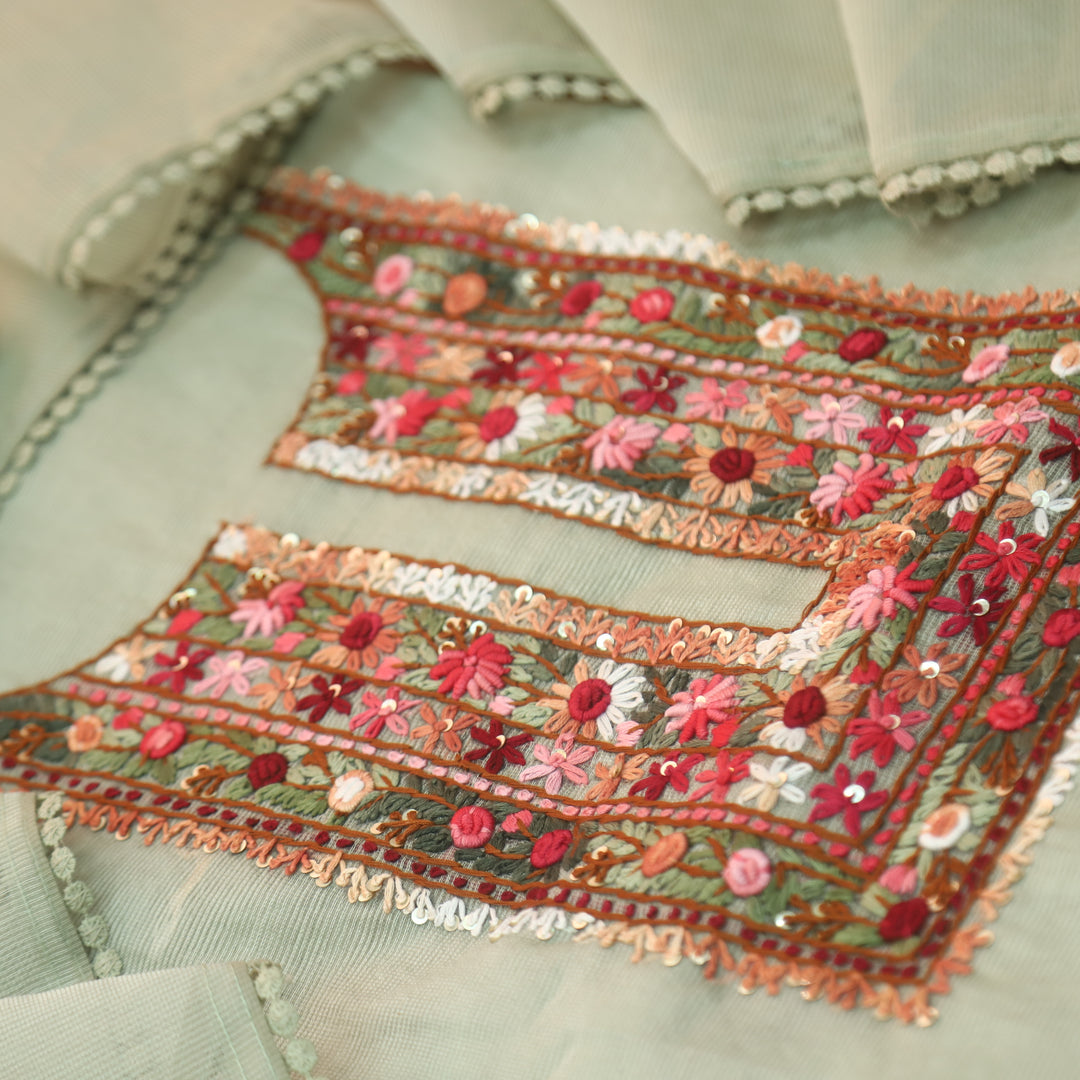 Mahi Pista Green All Over Thread Embroidered Neck Kota Doriya Net Suit Set