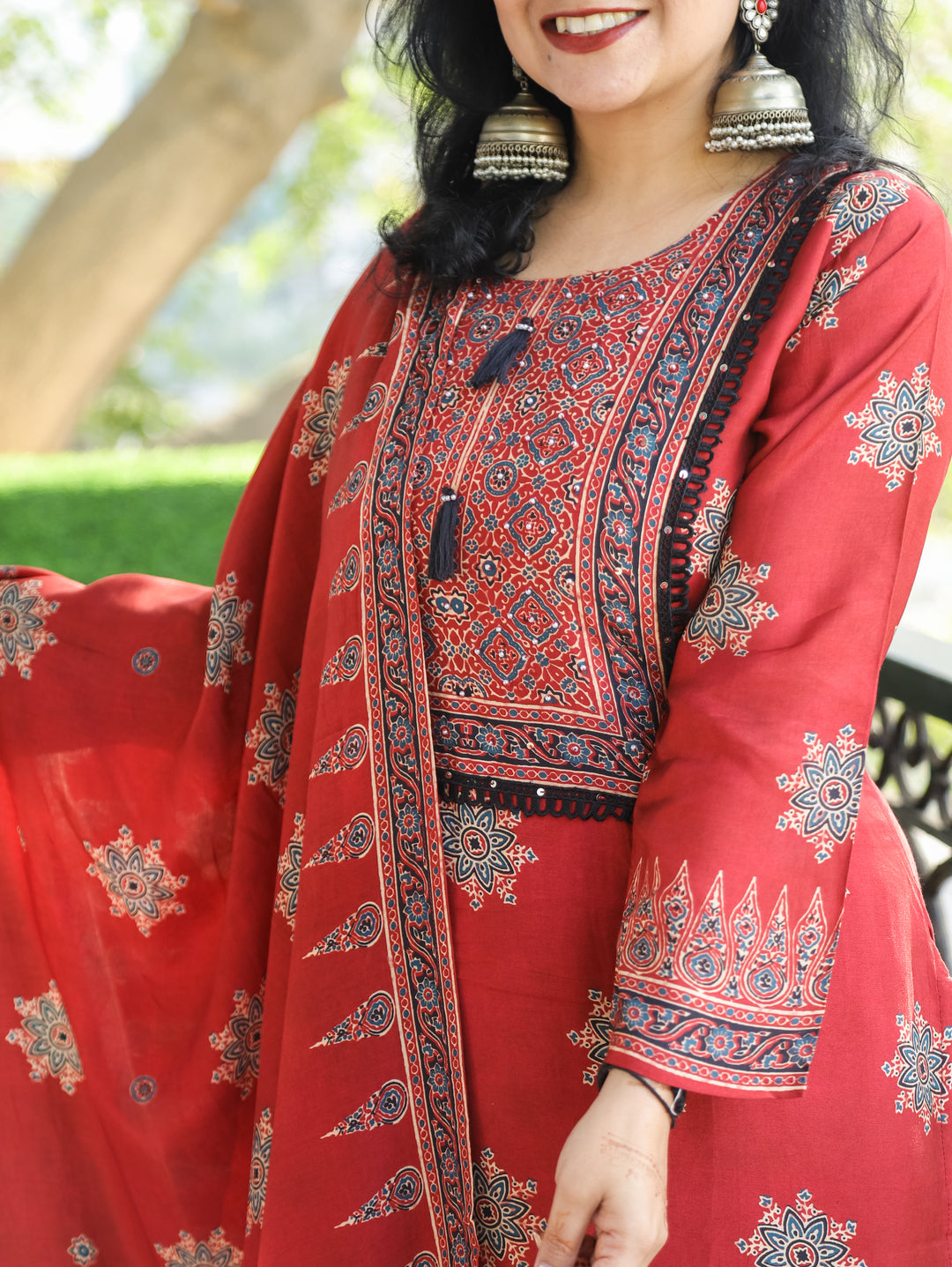 Bhoomika Cherry Red Moti with Tessal Work Ajrak Printed Pure Muslin 3 Piece Set