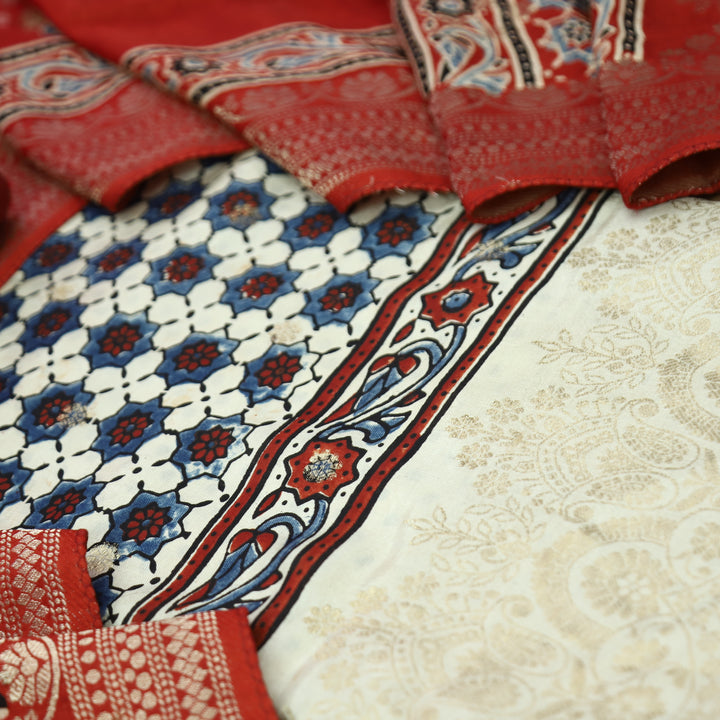 Musafir Pearl White Zari Woven Hem Ajrak Printed Dola Silk Set