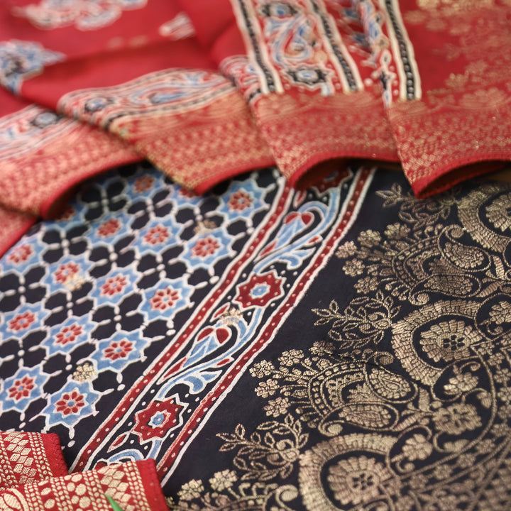 Musafir Ebony Black Zari Woven Hem Ajrak Printed Dola Silk Set