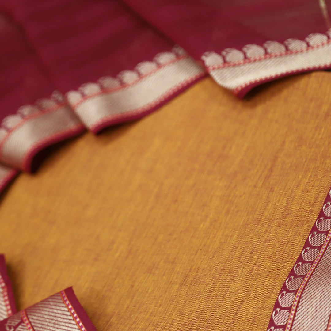 Sanskruti Tangerine Orange Mangalgiri Hem in South Cotton Suit Set