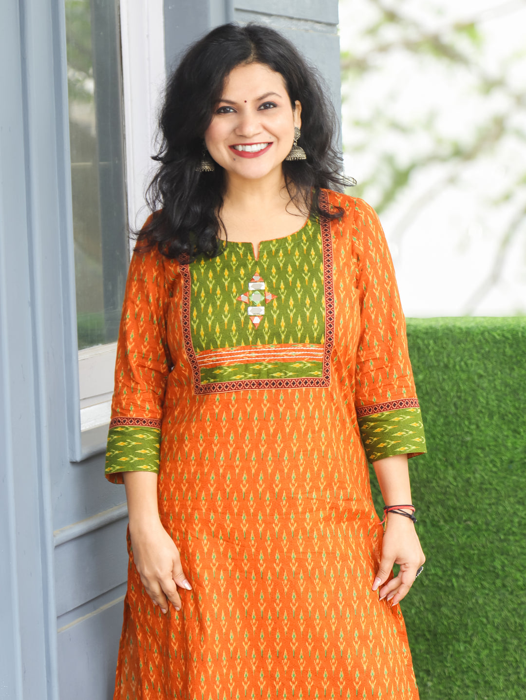 Kesariya Orange with Green Yoke with Mirror Work Ikkat Printed Cotton Kurti