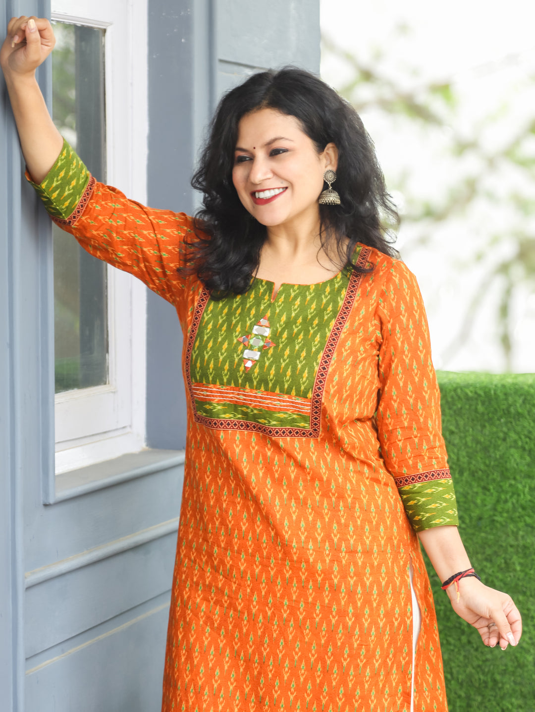 Kesariya Orange with Green Yoke with Mirror Work Ikkat Printed Cotton Kurti