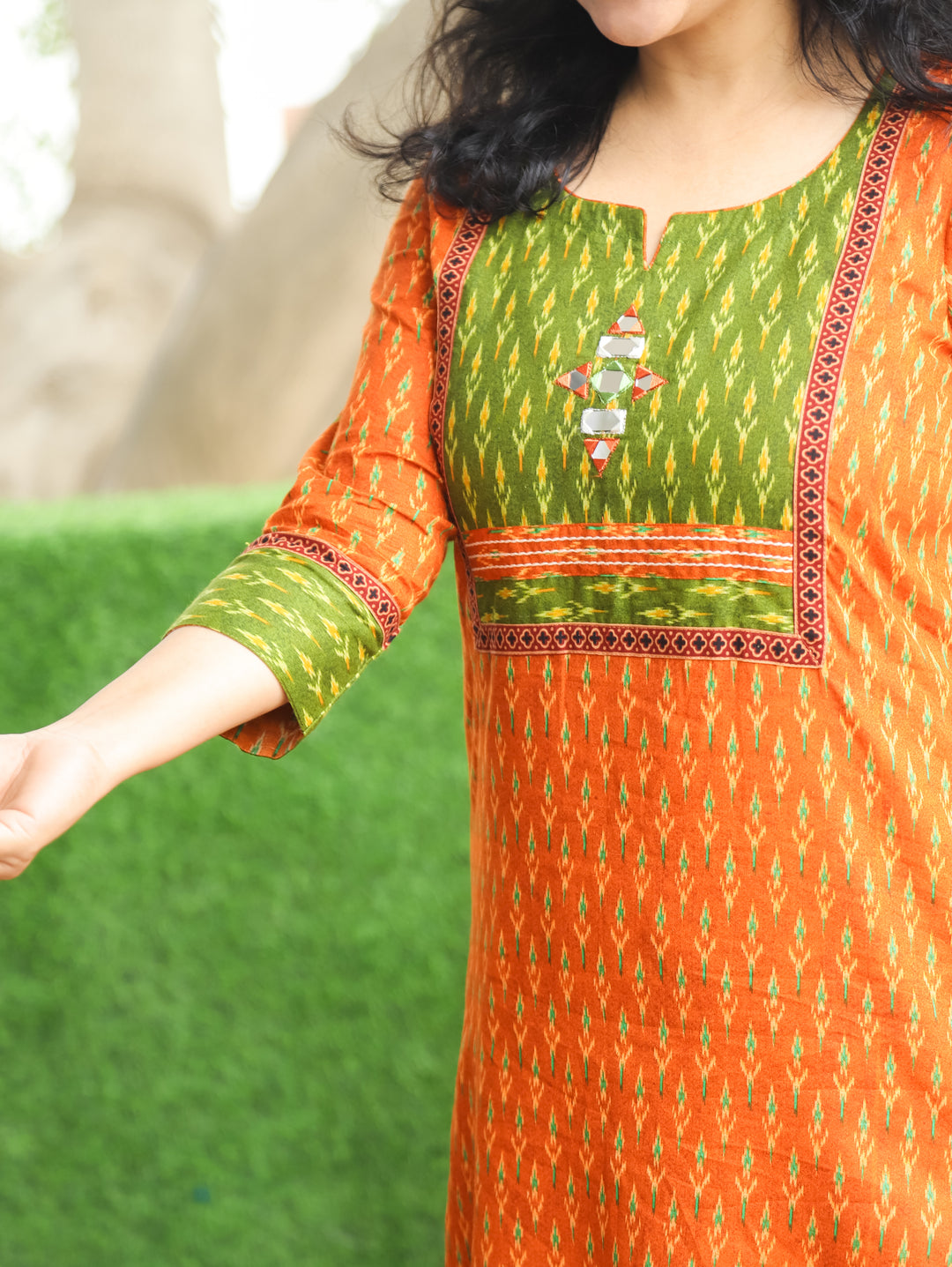 Kesariya Orange with Green Yoke with Mirror Work Ikkat Printed Cotton Kurti