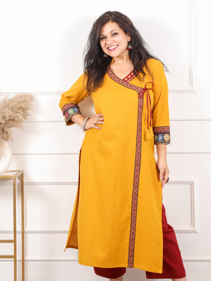 Raavi Mustard Yellow Long Angrakha Style Neck Cotton Flex Kurti