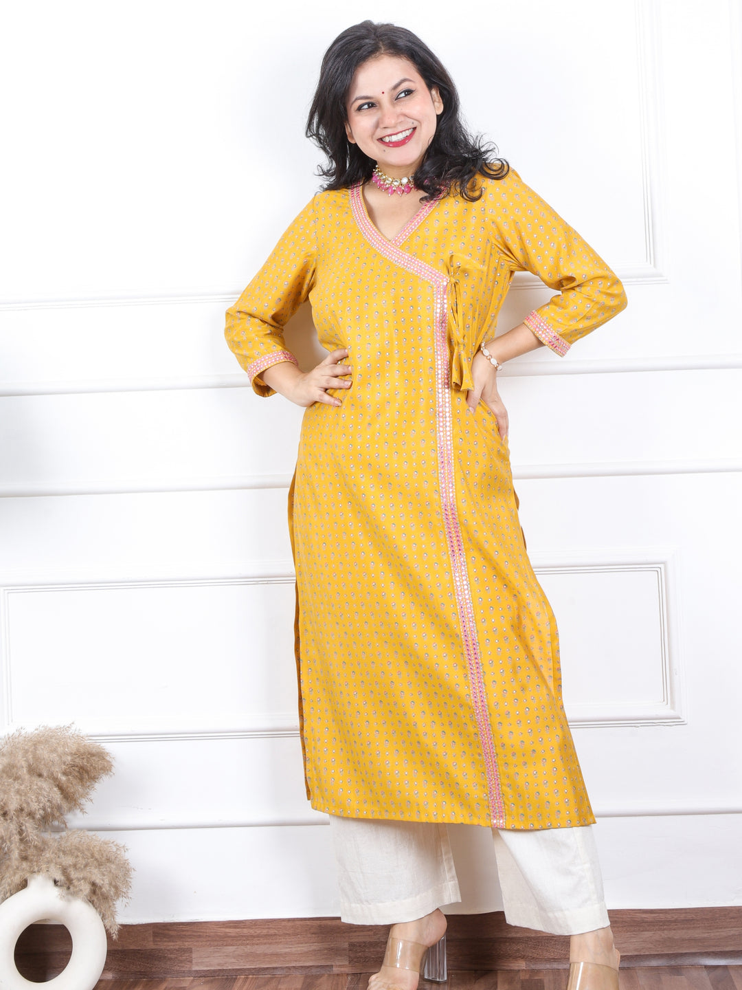 Aishwarya Canary Yellow Angrakha Style Neck Work Modal Kurti