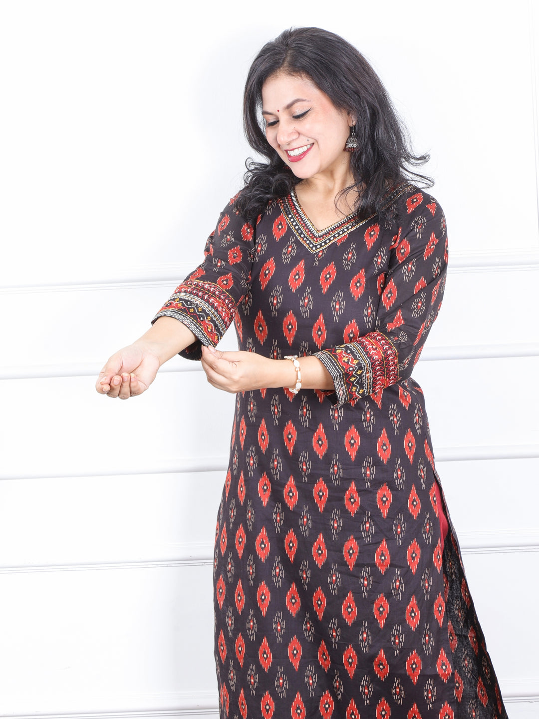 Daarshvi Ebony Black Printed V Neckline Lace Work Cotton Kurti