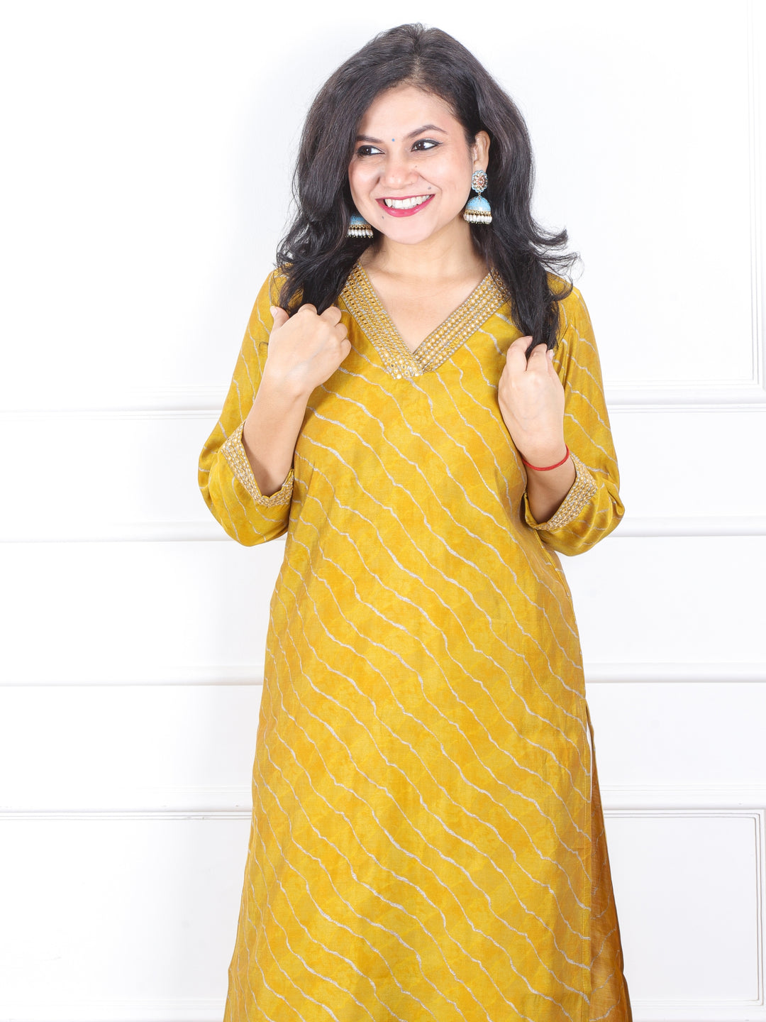 Prakriti Turmeric Yellow Leheriya Print with V Neck Lace Work Modal Kurti