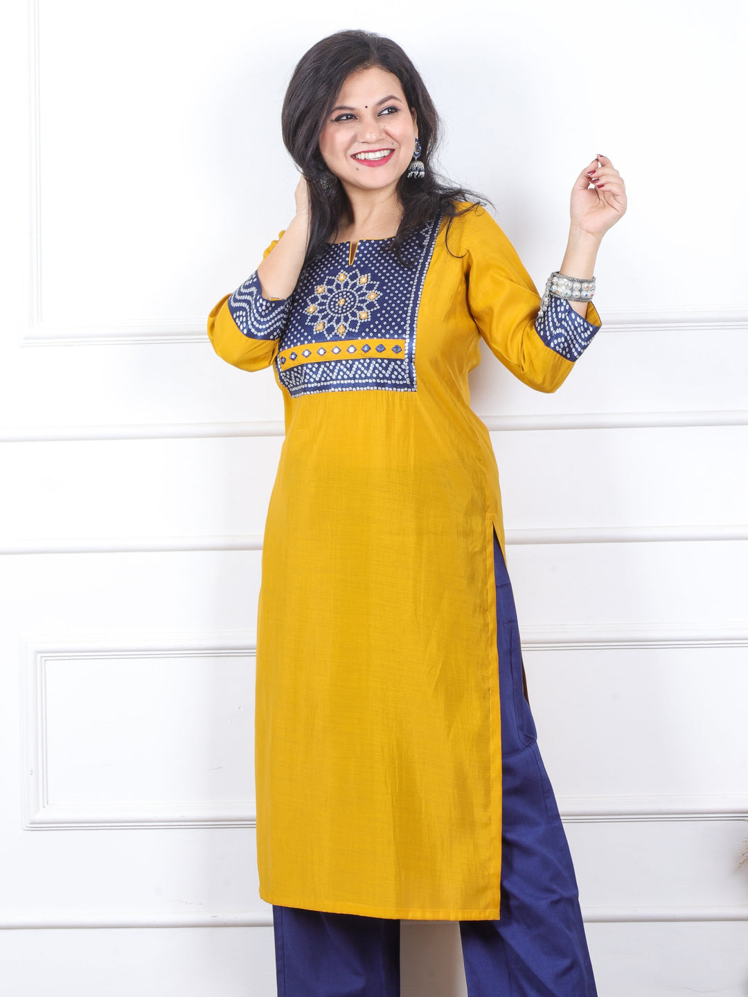 Raajhan Turmeric Yellow with Blue Mashru Patch Work Roman Silk Kurti