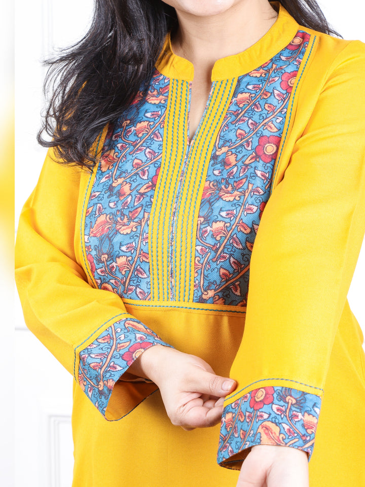 छाया Corn Yellow with Blue Kalamkari Printed Patch in Semi Pashmina Winter Kurti