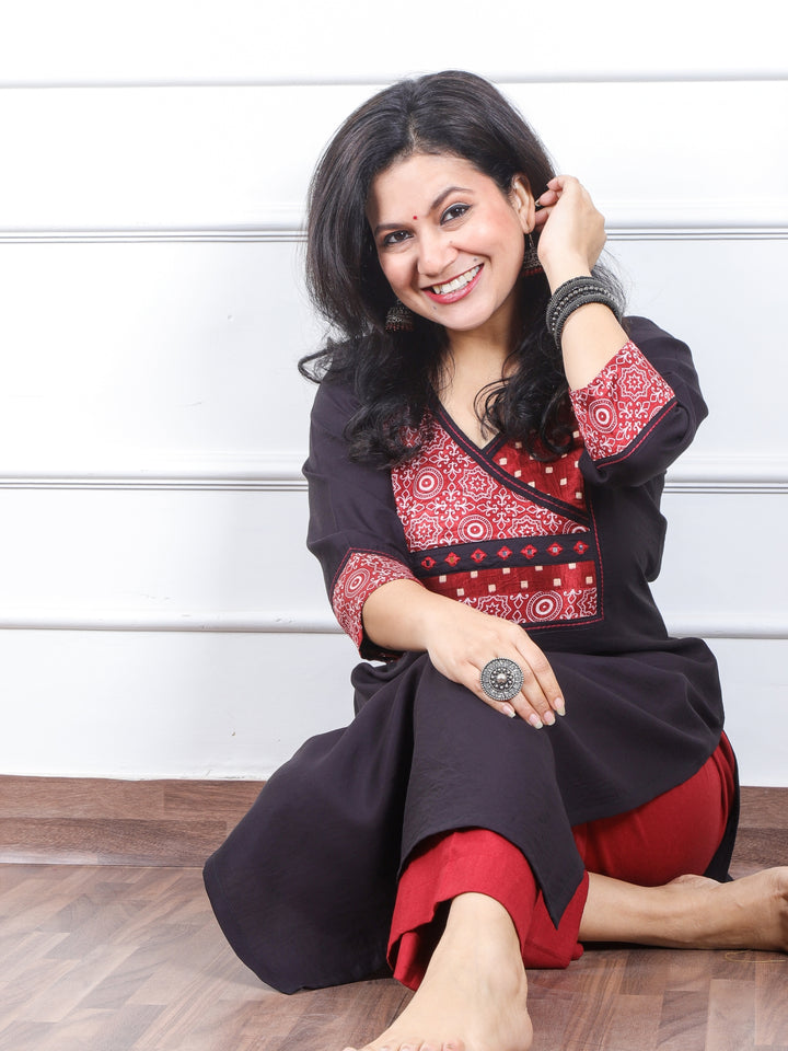 छाया Night Black in Mashru Angrakha Patch in Roman Silk Kurti