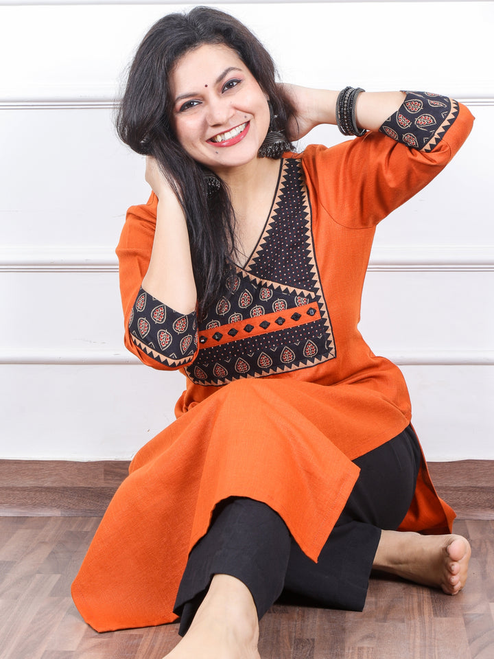 Dua Pumpkin Orange with Ajrak Print Patch Angrakha Style Neck Magic Linen Kurti